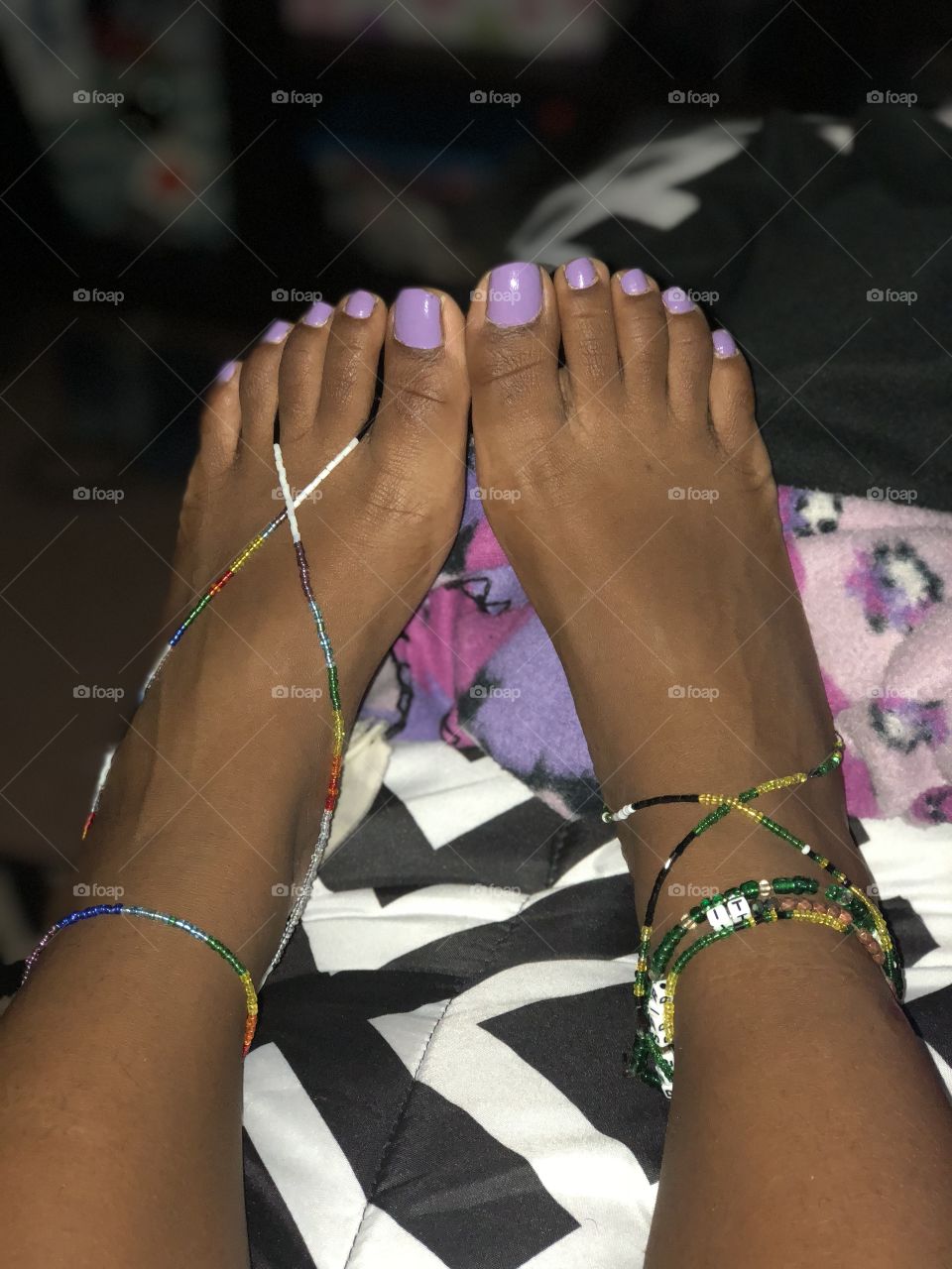 Cute chocolate feet with slamming nail polish and ankle beads 