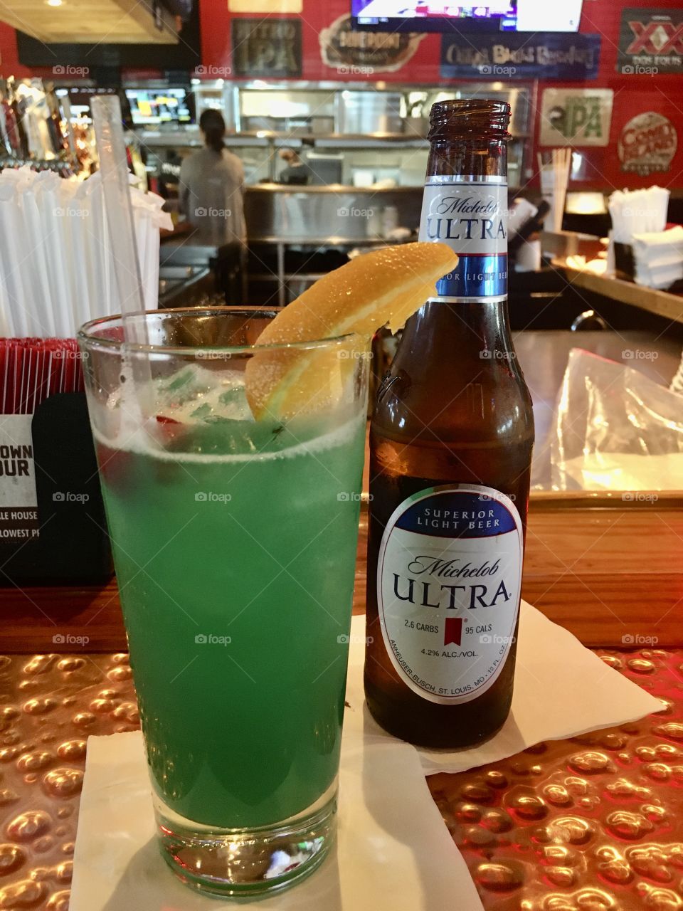 Blue Hawaiian and a Michelob ultra beer at the bar