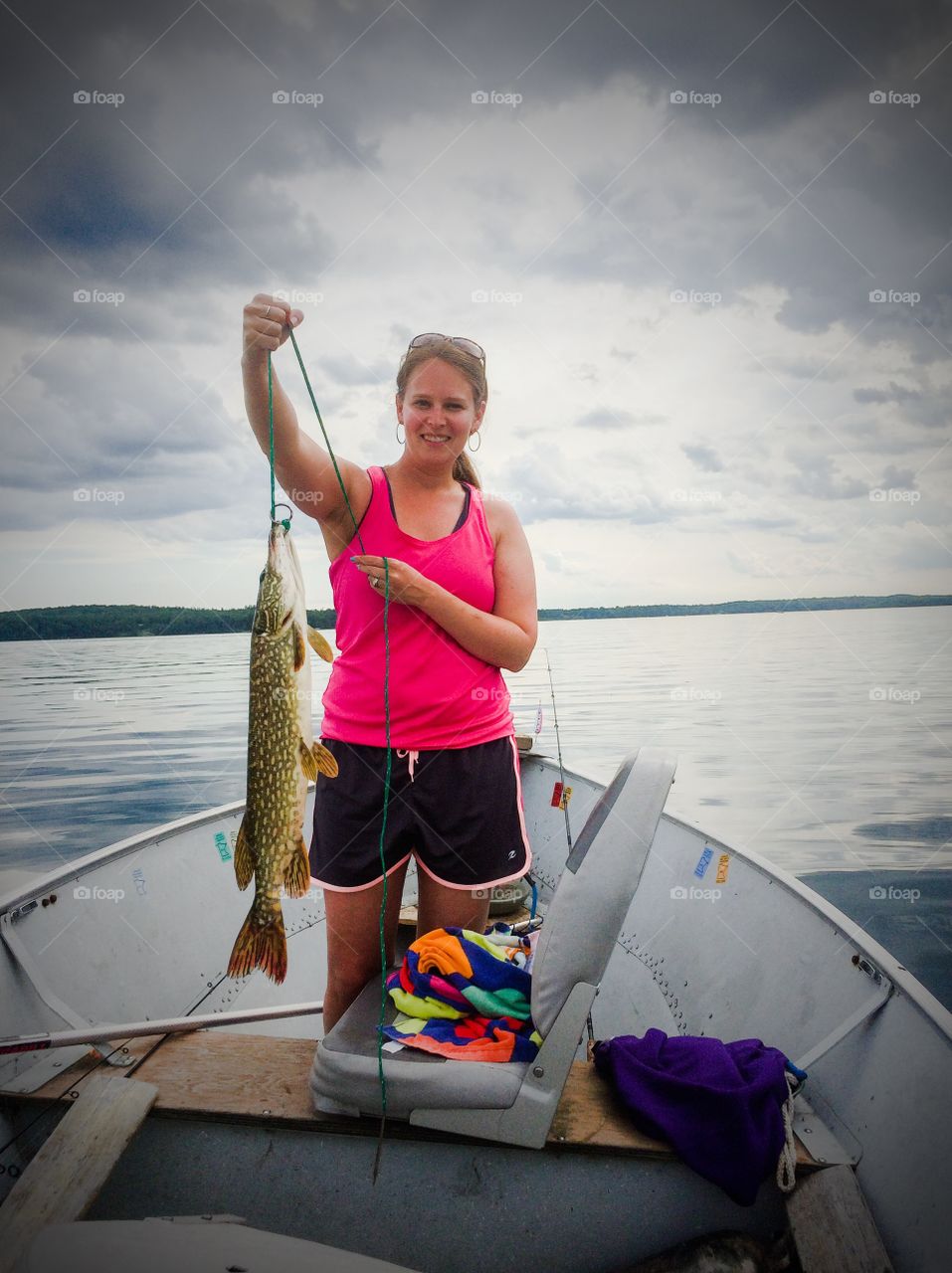 First catch of the summer. I've been fishing with my dad since I was a little girl. First northern pike  catch of the year.
