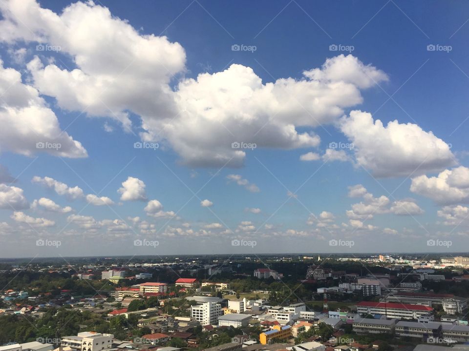 Clouds and blue sky background with landscape 