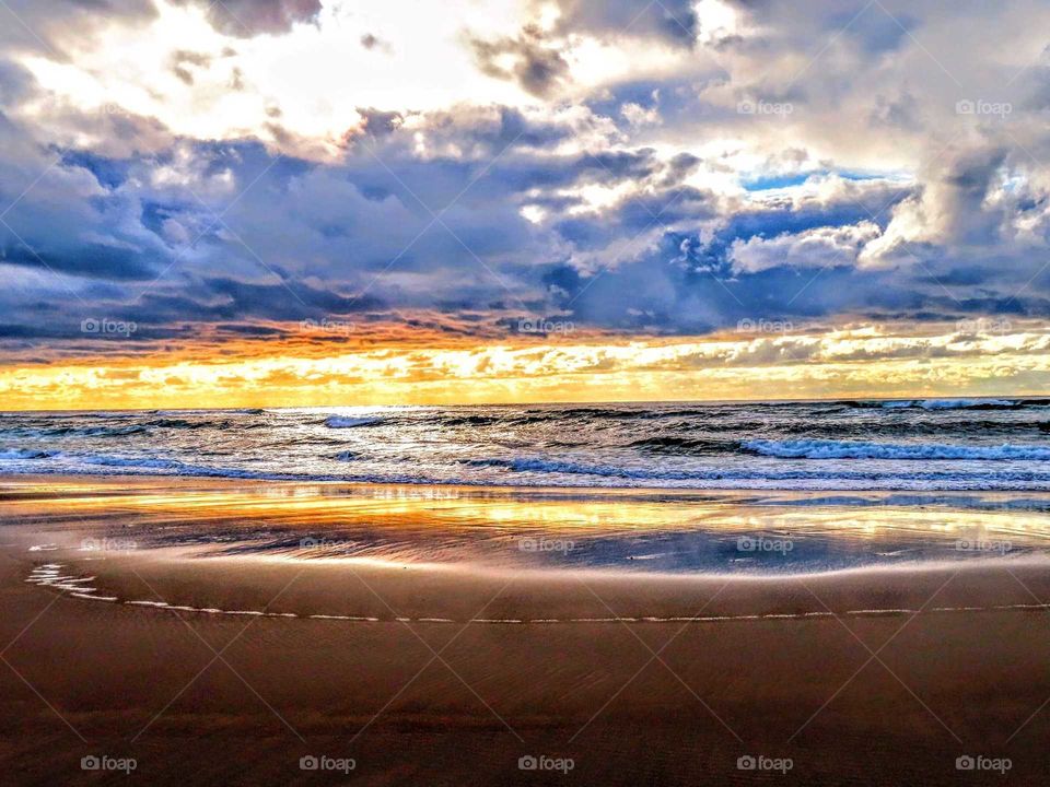 Colorful Sunset Over Ocean Filled with Textures and Stunning View "Blues and Yellows"