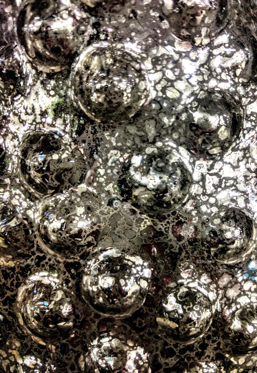 Full frame of chrome glass bubbles