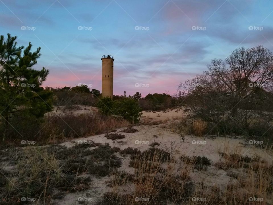 beach watchtower at dusk, sunset