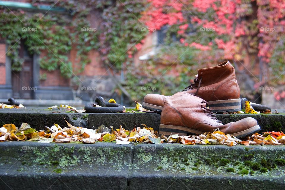 Boots and autumn background