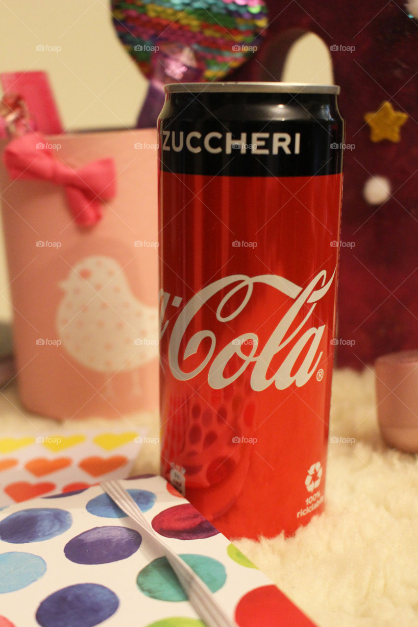 Coca Cola on a girl's desk