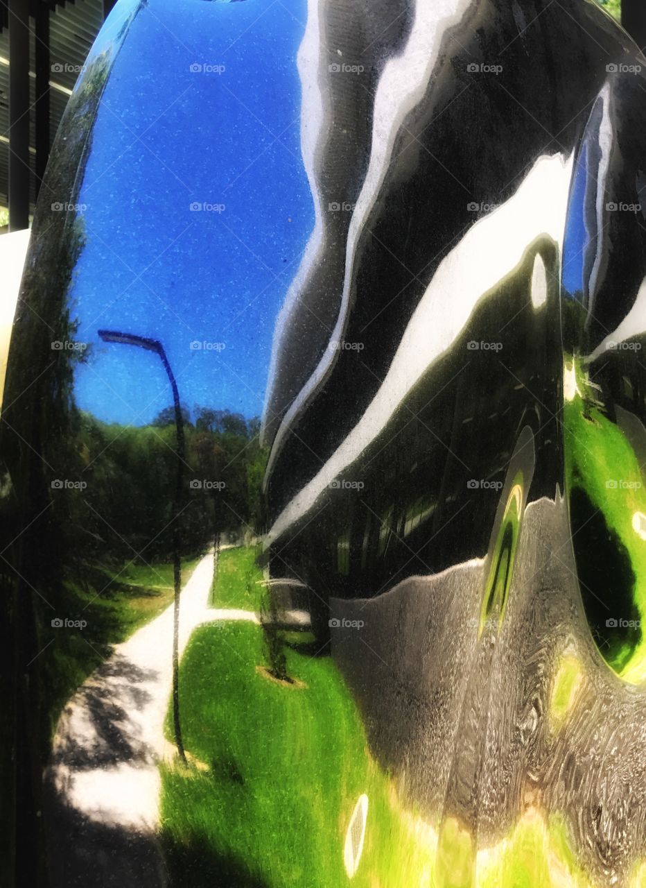 Reflection in statue