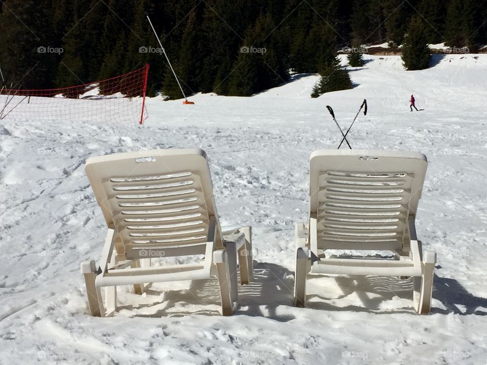 Chairs in the ski tracks