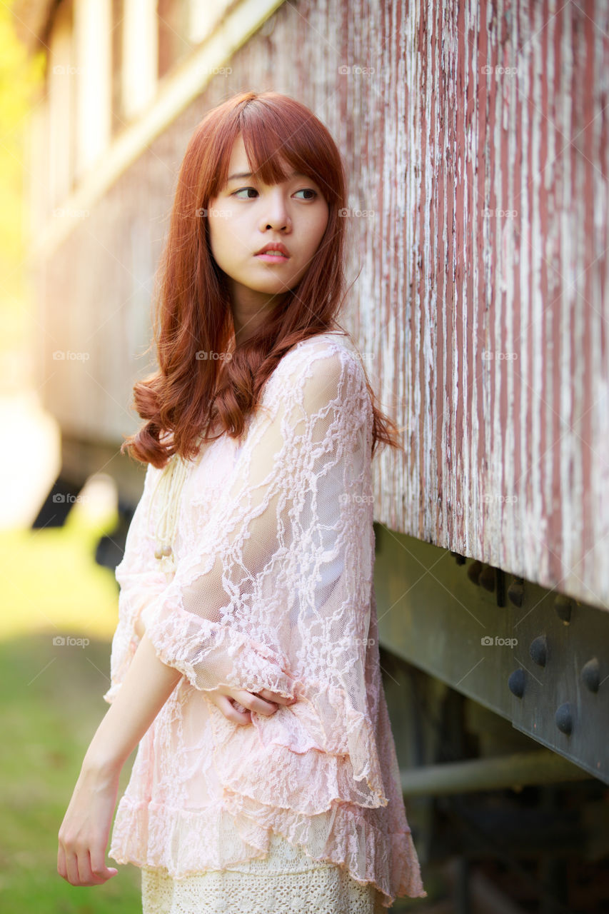 Young cute girl in the park