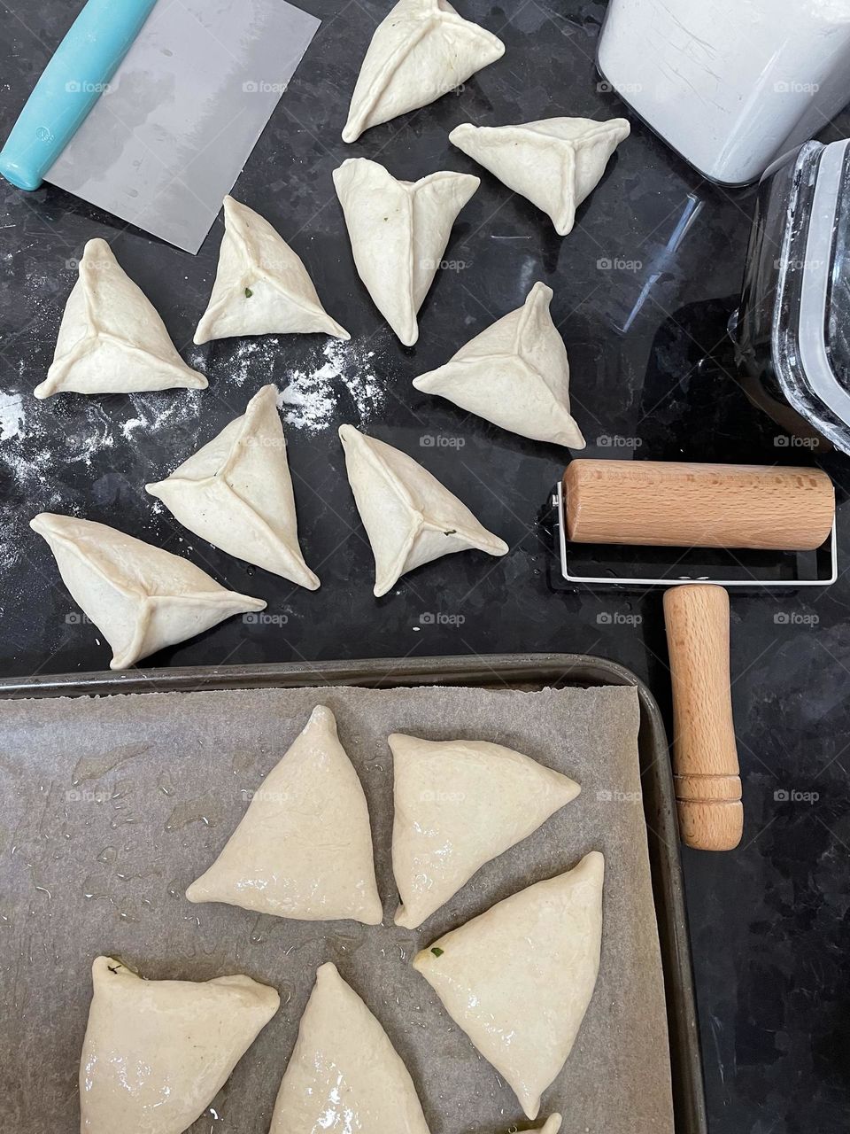 Making middle eastern spinach pies 