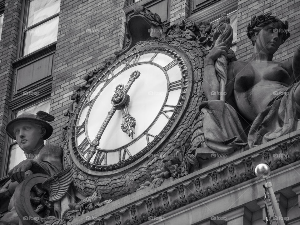 stone statues clock old by delvec