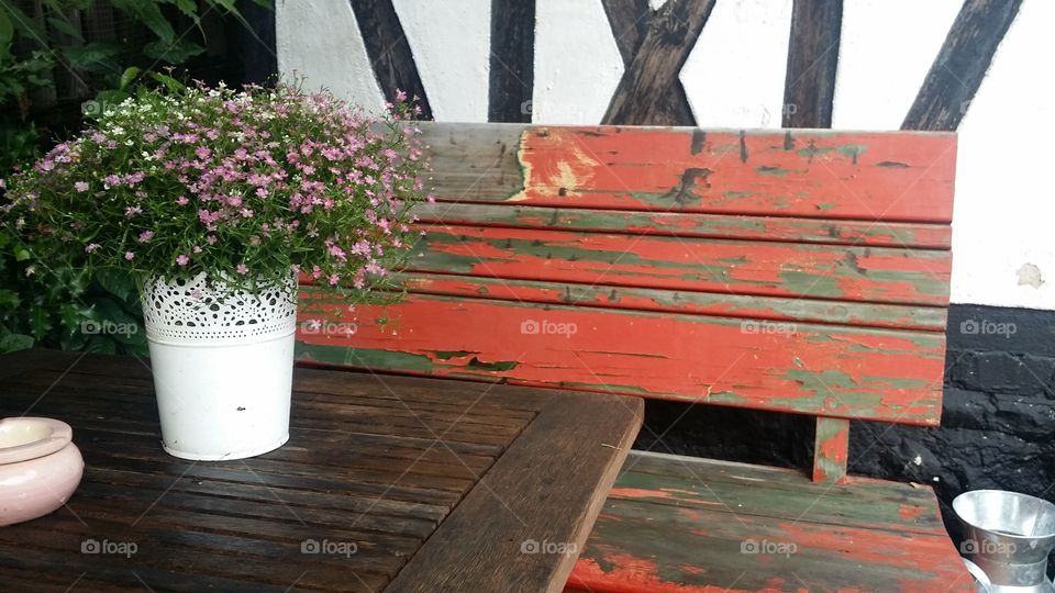 red garden bench