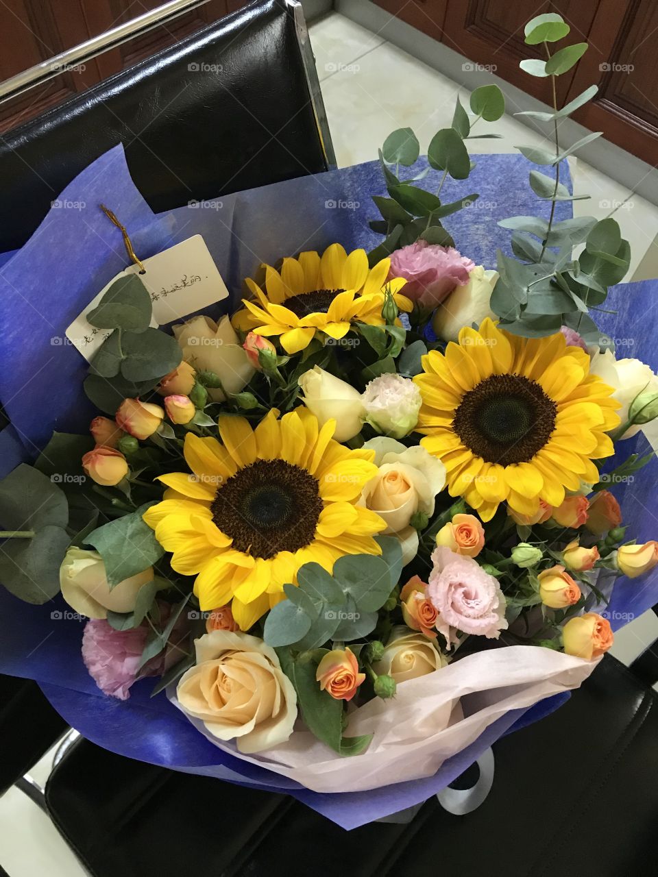Bunch of sunflowers and roses for gift 