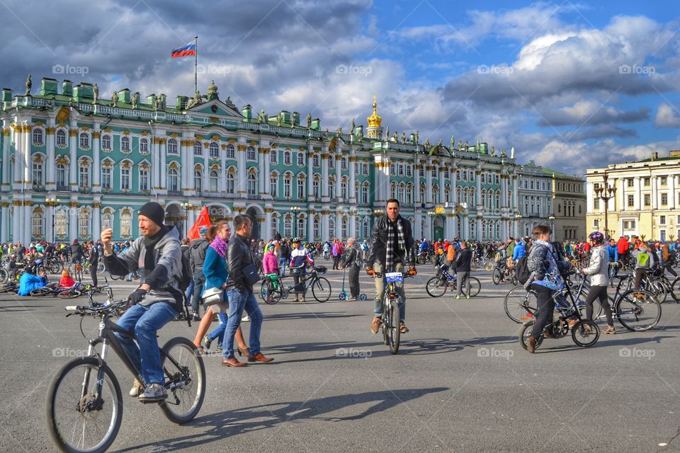 Spring, cyclists arrived ... Palace Square, St. Petersburg.