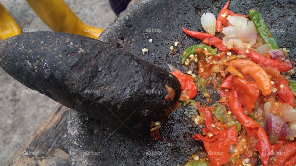 chili sauce is made from chili which is crushed so that the essence of chili comes out and other ingredients are added, such as salt and shrimp paste.