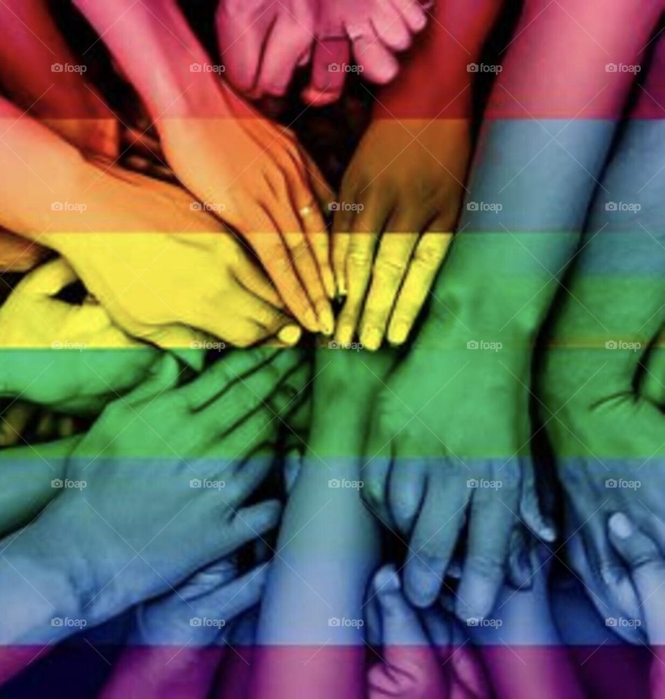 Colors of lgbtq community, hands of people 