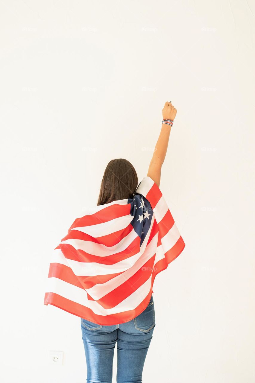 woman holding USA flag