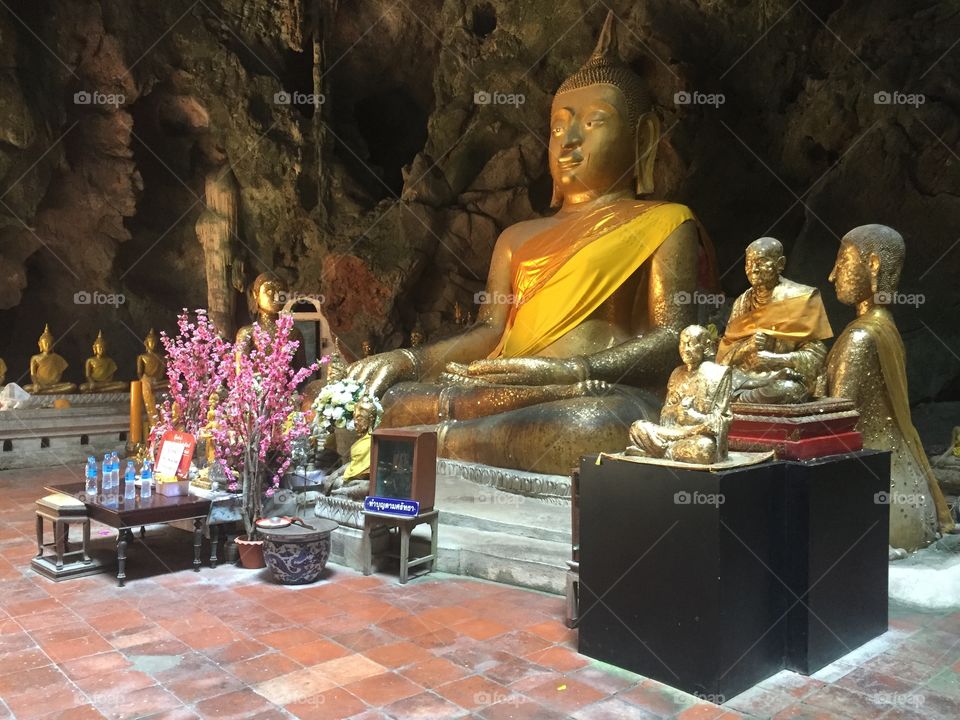 Large Buddha at underground cave In phetchaburri Thailand 