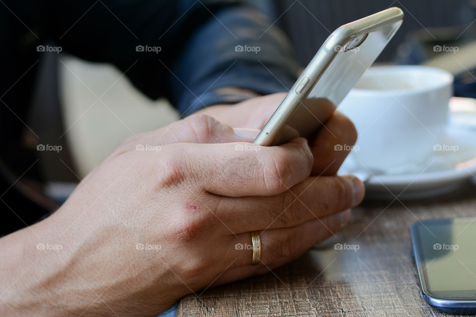 man holding a mobile phone