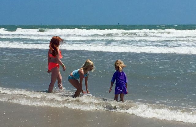 Children playing at the beach