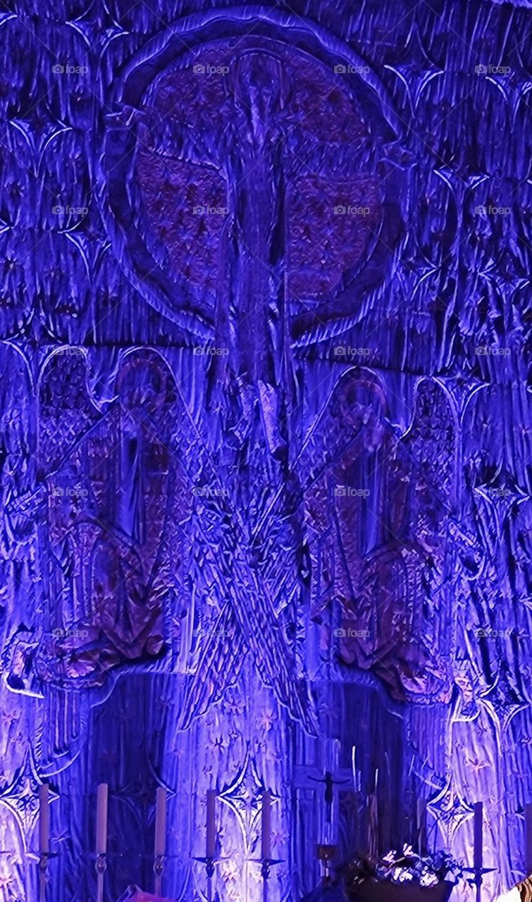 This is the painting above the altar of the “Christuskirche”, the “Christ Church” in “Straubing”, “Niederbayern” or “Lower Bavaria”. It is bathed in a deep purple light for an evening of special festivities. 2024. Hypnotic Productions