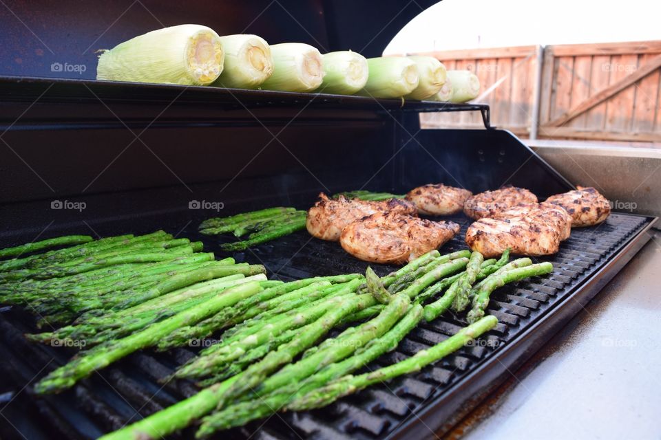 Chicken and aspargus corn on grill