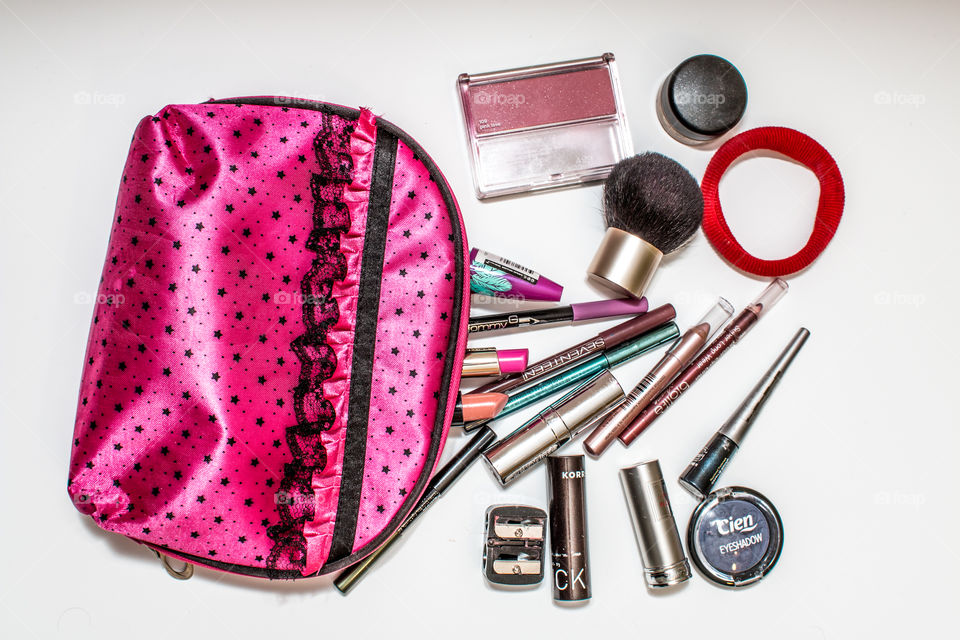 Makeup And Cosmetics Pink Bag Isolated On White Background
