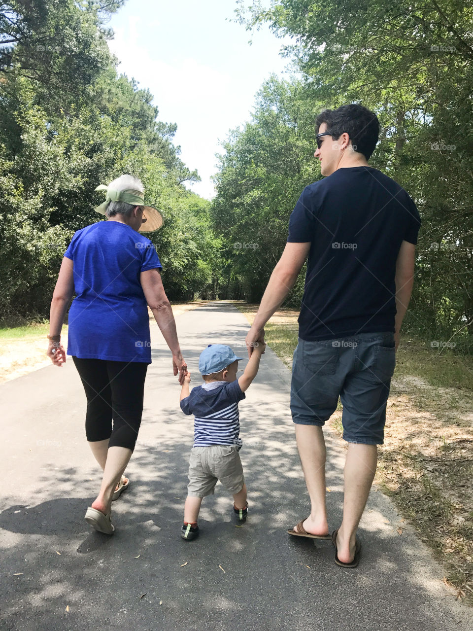 Walking to the park with grandma and dad