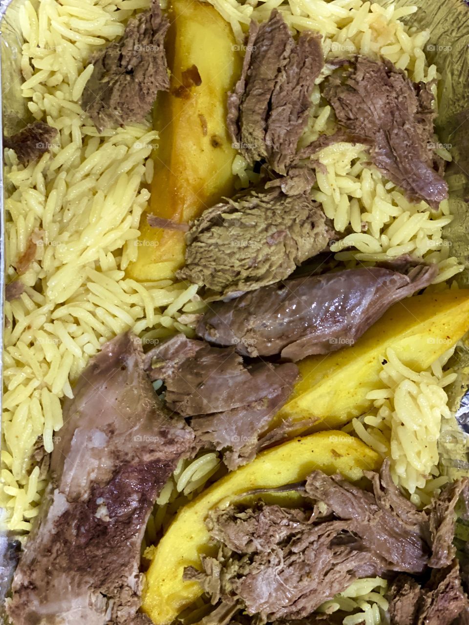 Arabic rice and meat, photo of mouthwatering Arabic masala rice and  grilled mutton meat shredded on top of the rice, 
