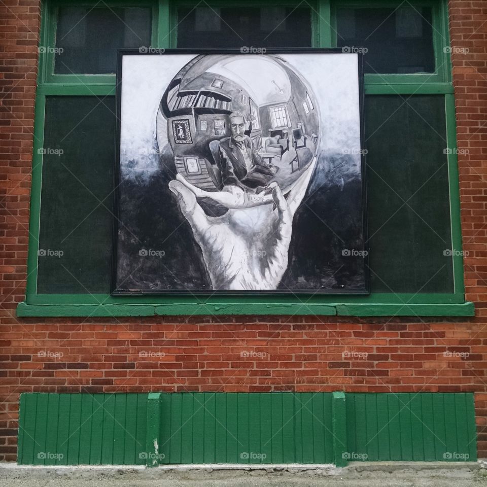 A painting hung on a building