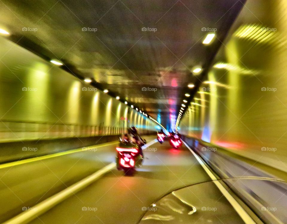 motorcycles in tunnel
