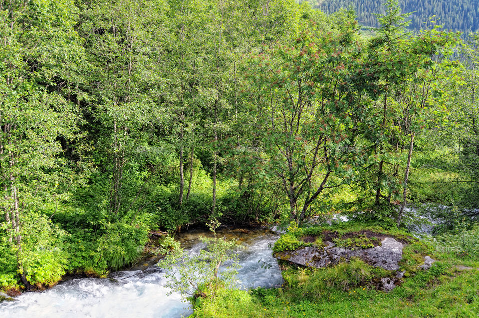 European alps landscape. Stream flowing though Schwarzachtal valley in zillertal alps. Austria.