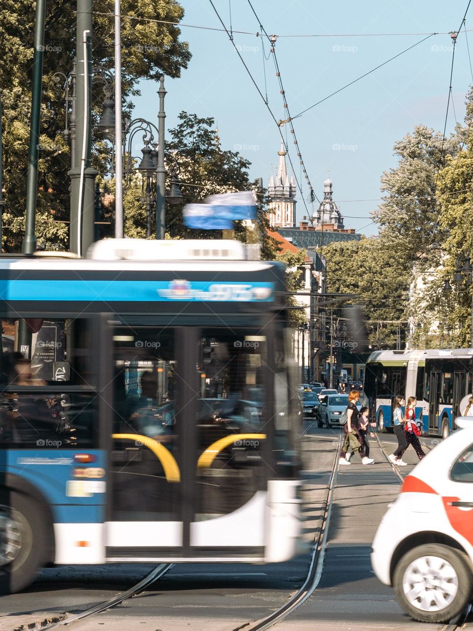 the bus is going through a congested intersection