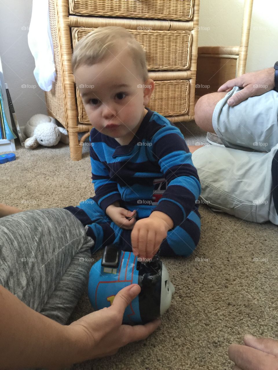 Filling his piggy bank