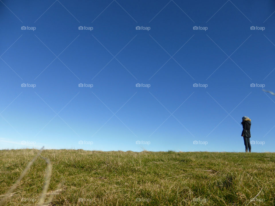 A person standing over there at the bottom