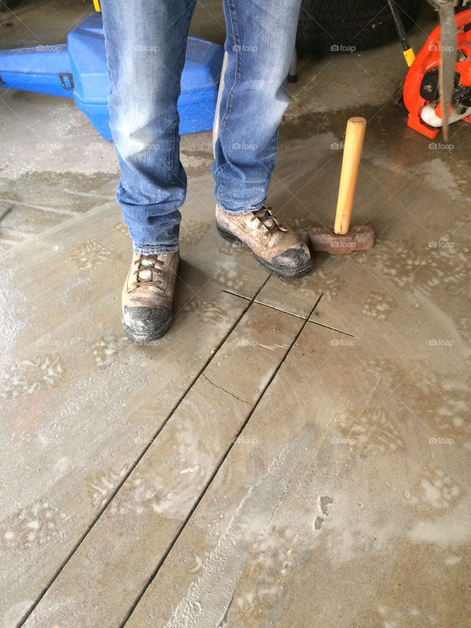 Love using new tools - rented a cool gas powered saw to cut a garage floor drain