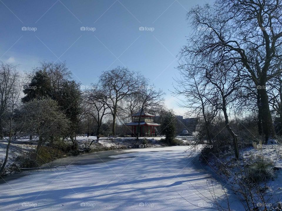 Victoria Park, London, in the snow on a clear day