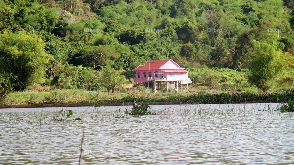 The pink house: life by Tonle sap lake, Kampong chhnang, Cambodia