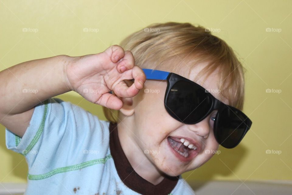 Happy boy wearing sunglasses