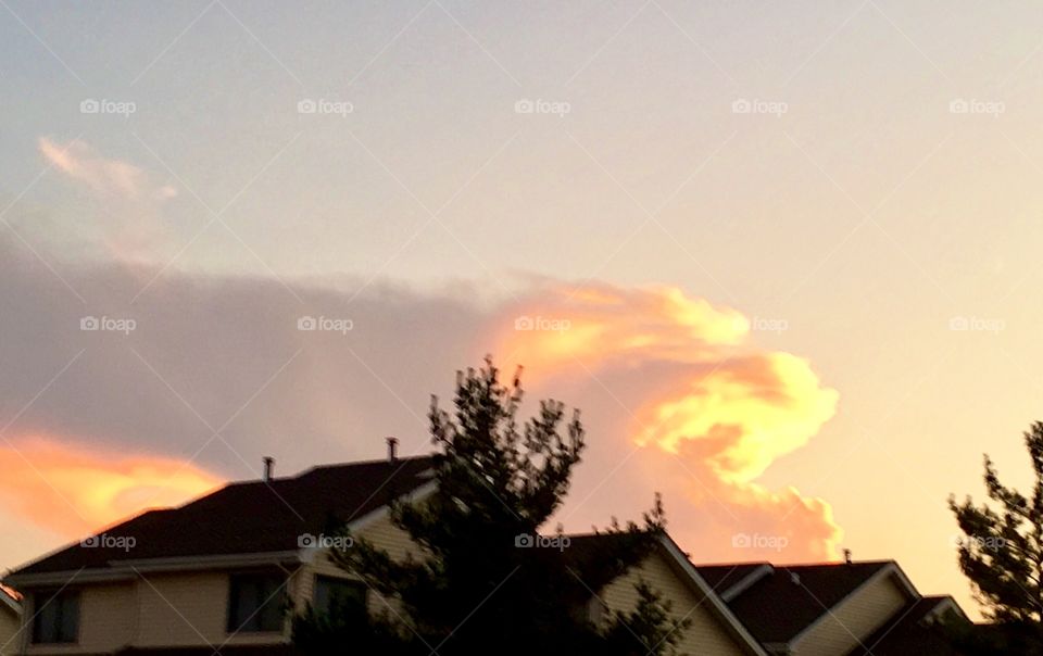 Monster cloud formations at sunset painted  silhouette 