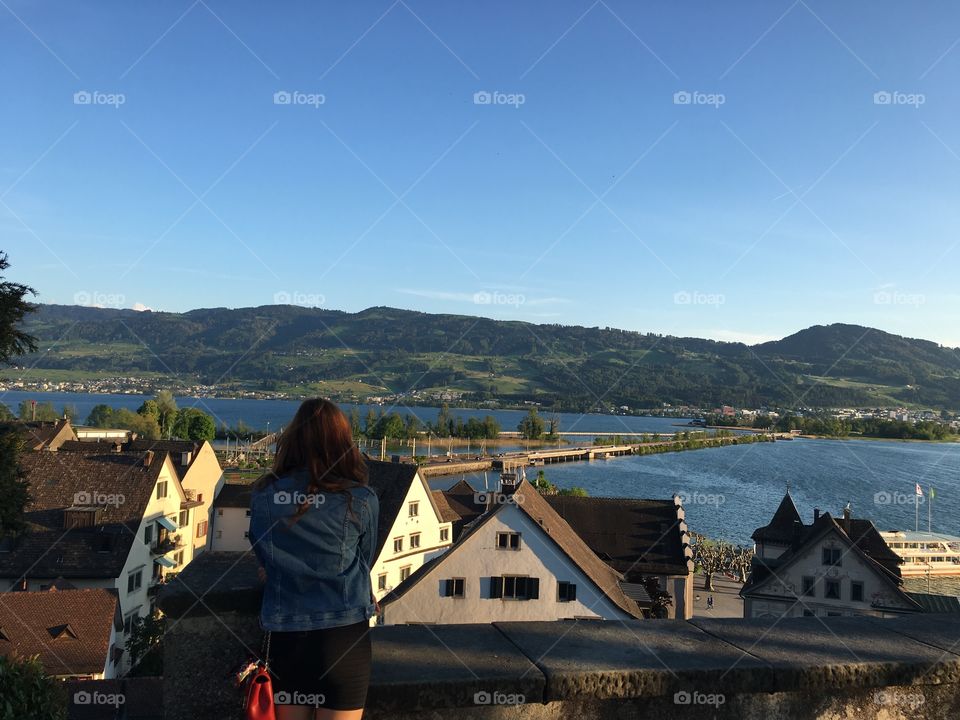 Rear view of person against zurich lake