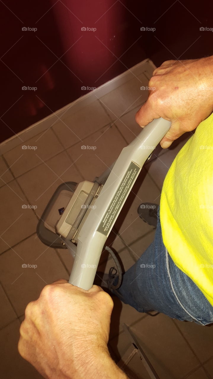 Man Polishing Floor