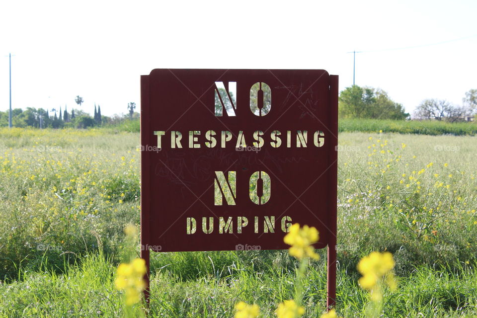 no trespassing sign springtime