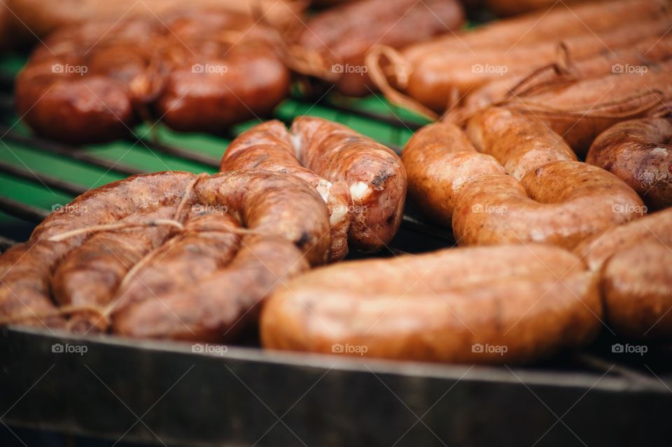 Close-up of sausages being prepared