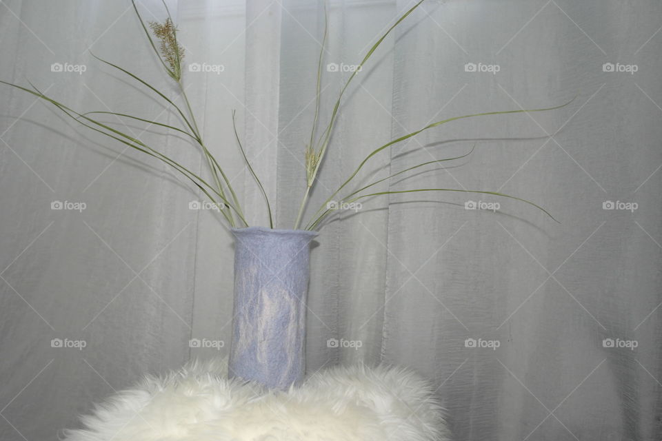 Felting blue vase with dried flowers 