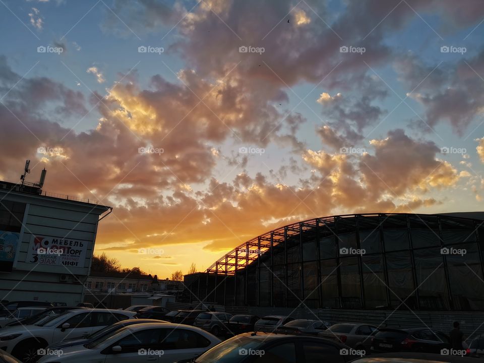 Sunset sky mood clouds nature street outdoor colors view home outdoor outside building way road decor decoration design yellow honey cars parking