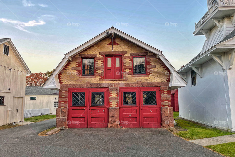 Red doors on a brick building 