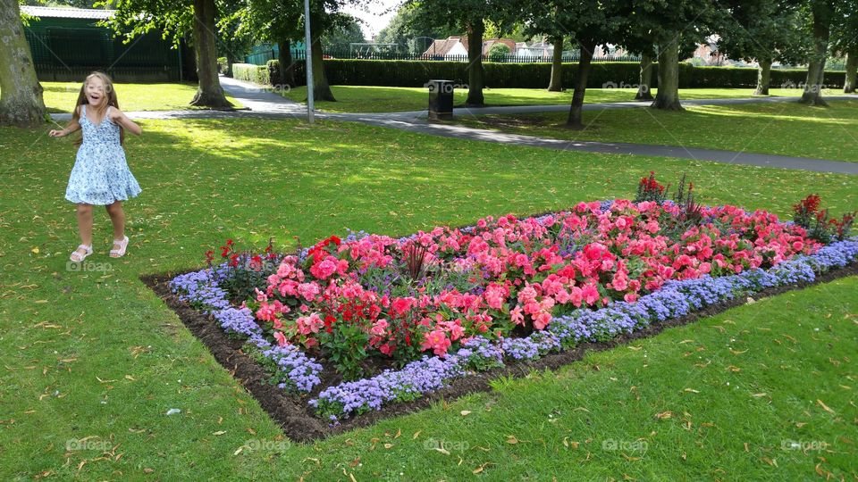 happy child playing in a brightly coloured park