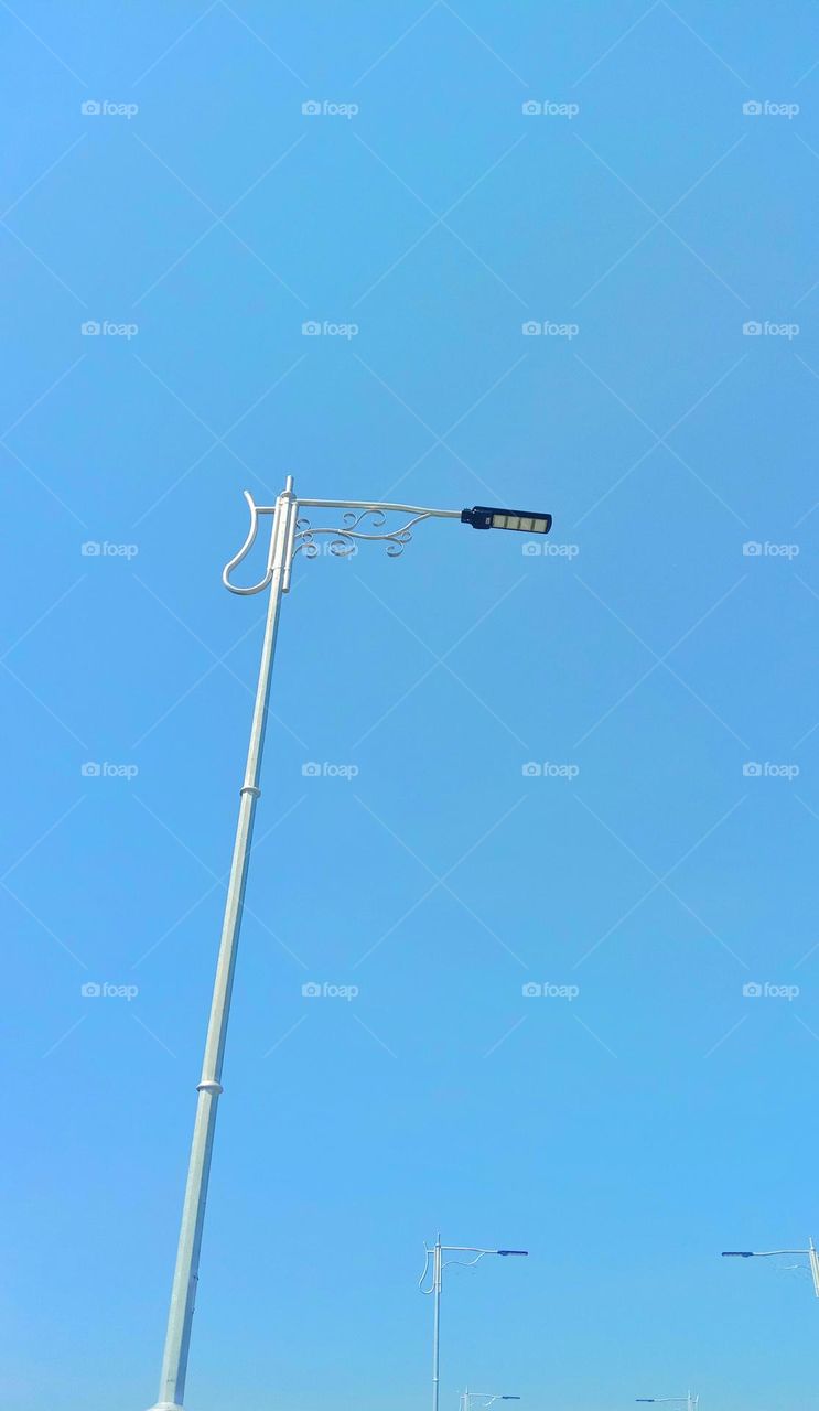 Street lamp with blue sky