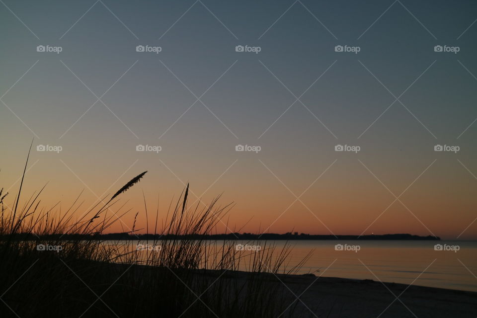 Evening mood on the beach of Juliusruh on the island of Rügen with a view to the "Kap Arkona"