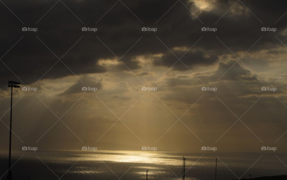 Heavenly sunlight through the clouds